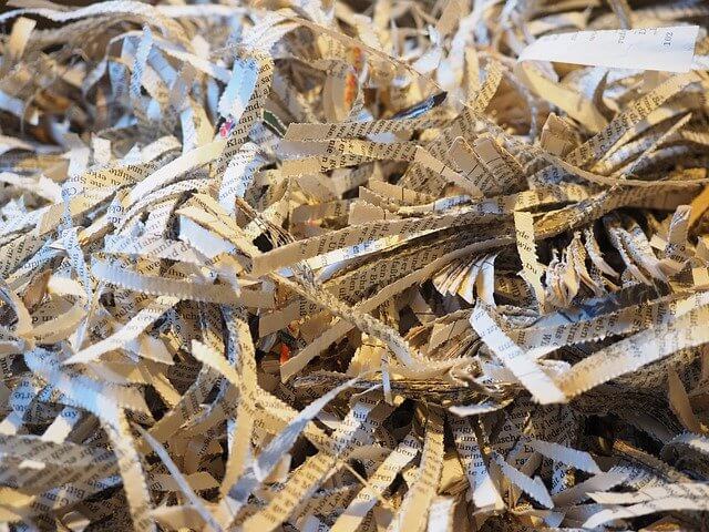 recycled paper shredded and ready for pulping